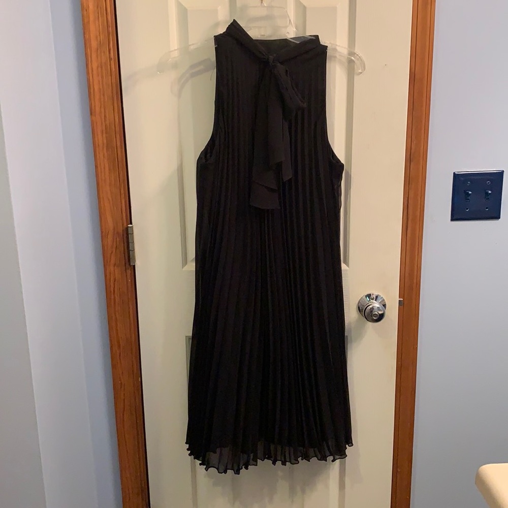 Beautiful pleated black cocktail dress with bow